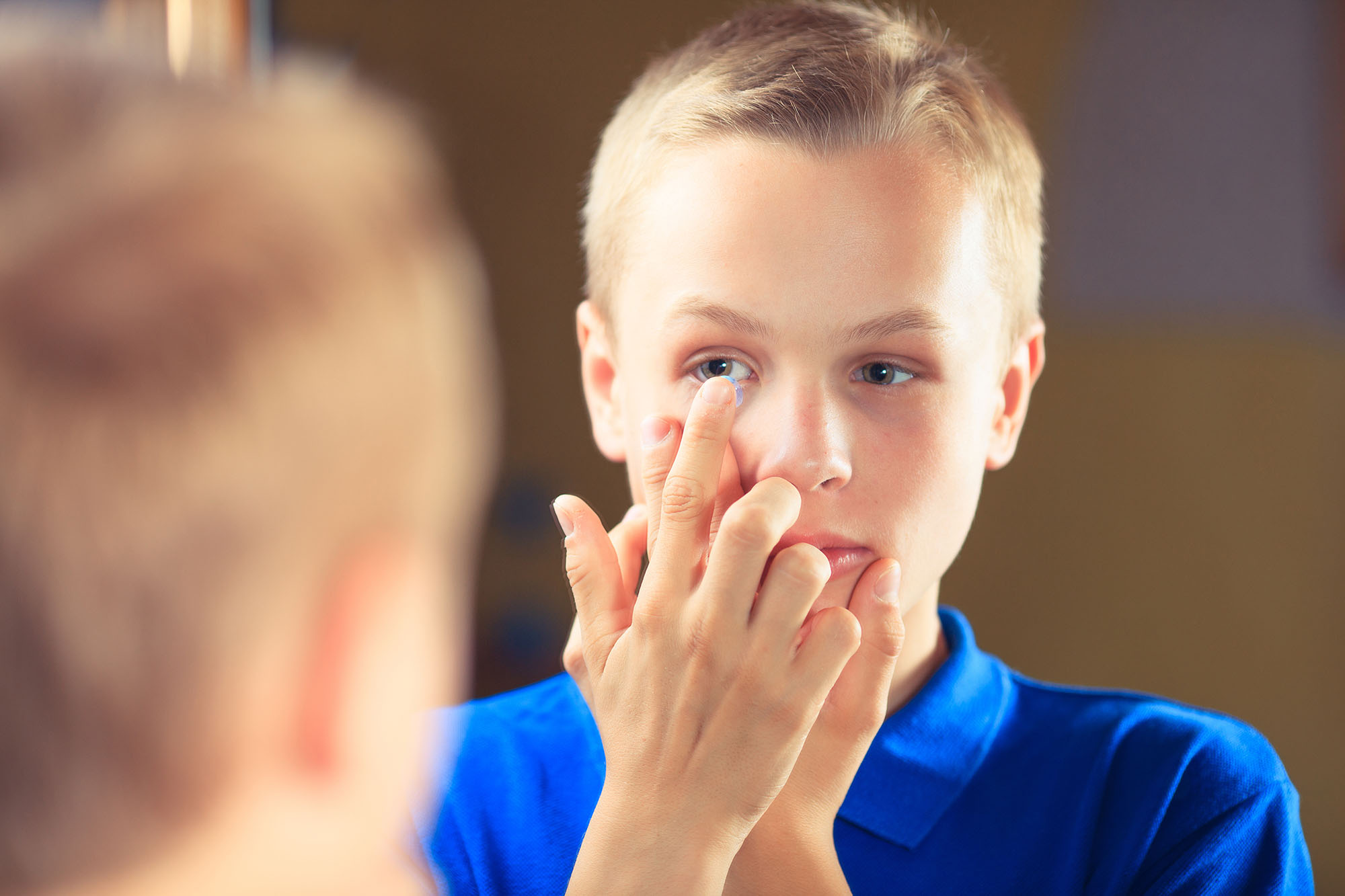 Apply an orthok lens to your child's or someone else's eye 